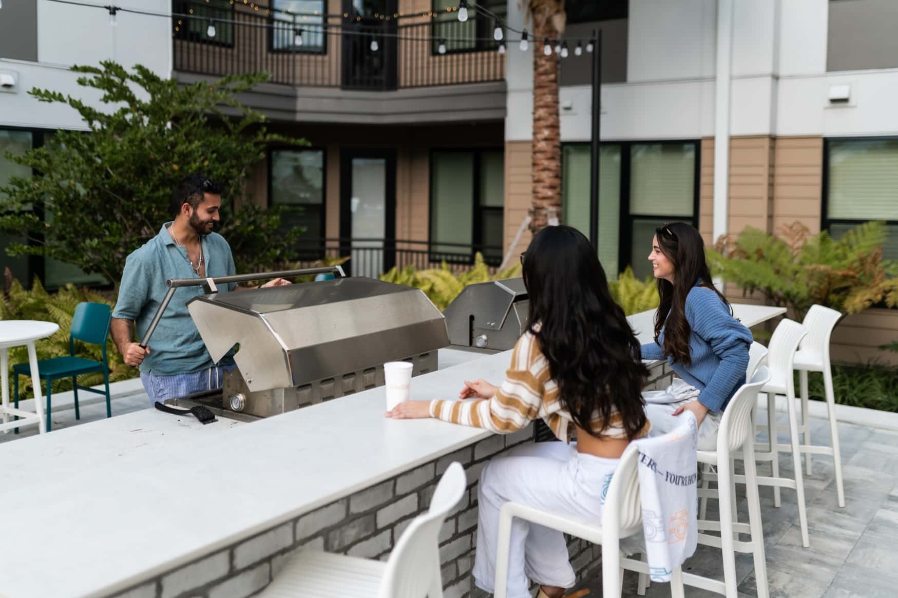 Aperture residents grilling in the courtyard