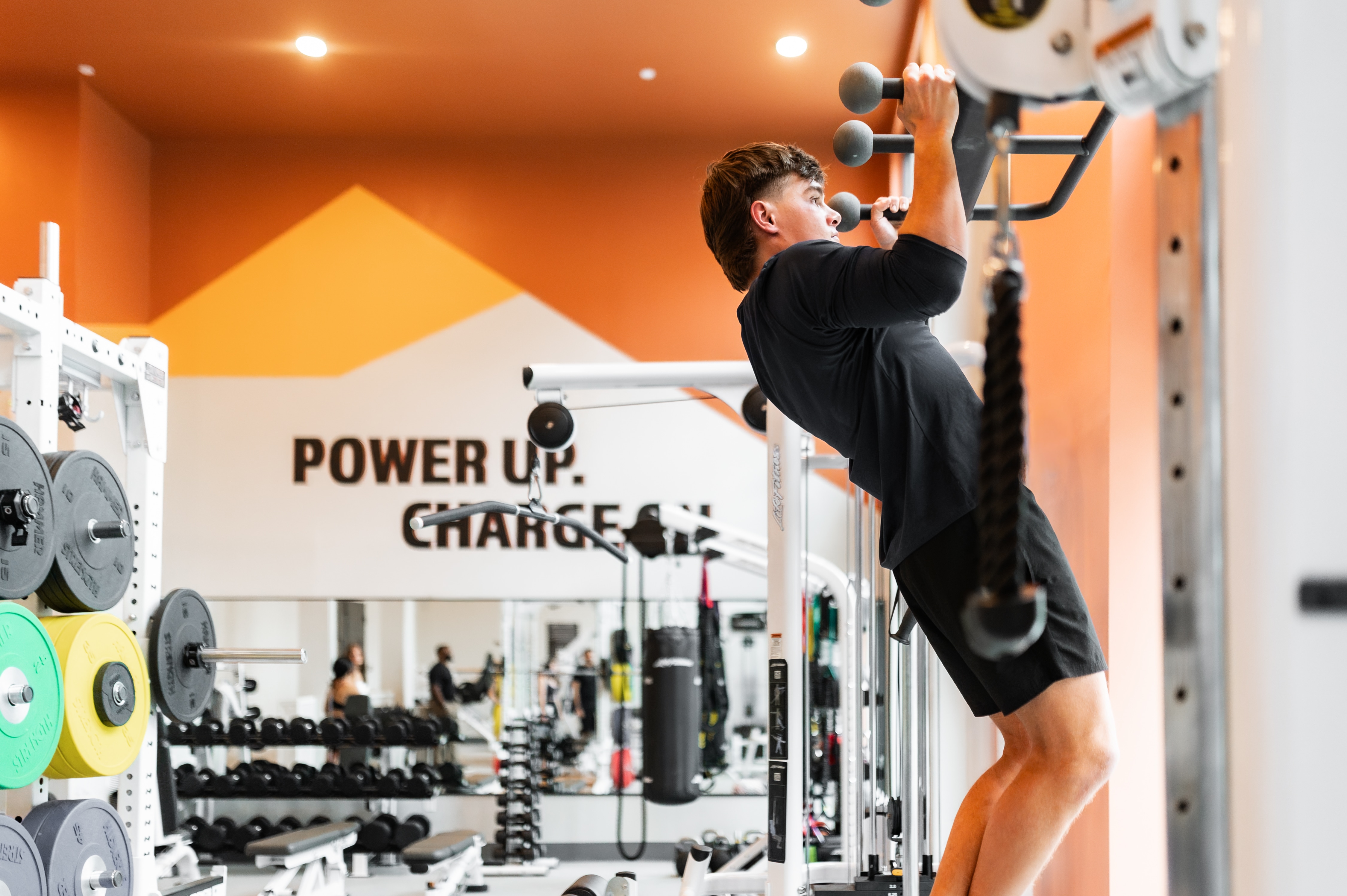 Aperture resident working out in the 24-hour fitness center